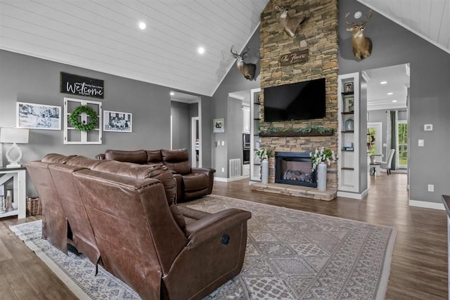 3571 Old Blacktop Rd, Mc Ewen, TN 37101 - living area with wood ceiling, wood finished floors, a fireplace, baseboards, and high vaulted ceiling