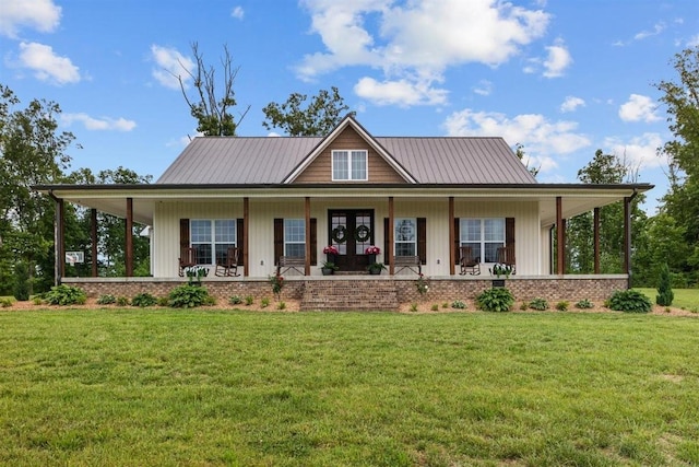 3571 Old Blacktop Rd, Mc Ewen, TN 37101 - farmhouse with covered porch and a front yard