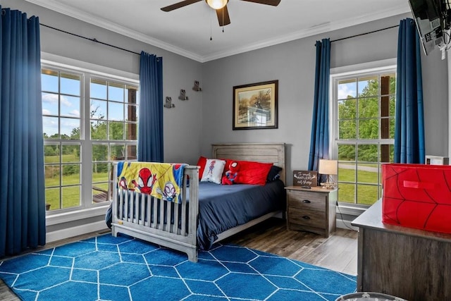3571 Old Blacktop Rd, Mc Ewen, TN 37101 - bedroom with wood finished floors, ornamental molding, multiple windows, and ceiling fan