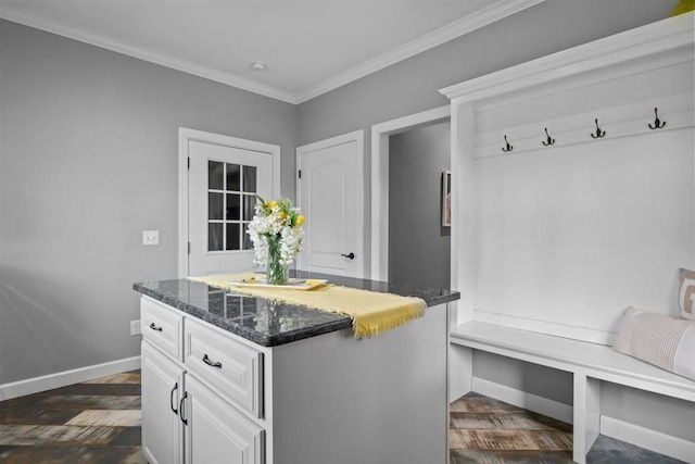 3571 Old Blacktop Rd, Mc Ewen, TN 37101 - mudroom featuring baseboards, crown molding, and dark wood-type flooring