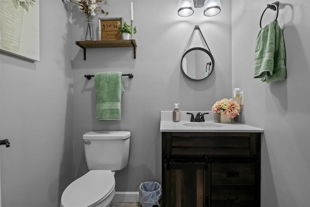3571 Old Blacktop Rd, Mc Ewen, TN 37101 - half bathroom featuring toilet, vanity, and baseboards