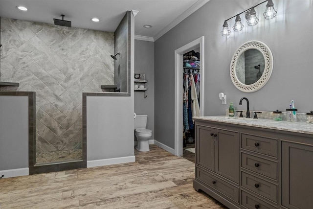 3571 Old Blacktop Rd, Mc Ewen, TN 37101 - full bath featuring vanity, ornamental molding, wood finished floors, walk in shower, and toilet