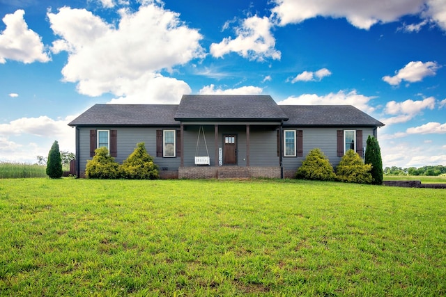 82 Staggs Rd, Ethridge, TN 38456 - ranch-style house with a front yard and roof with shingles