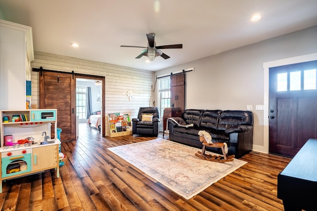 82 Staggs Rd, Ethridge, TN 38456 - living room featuring a barn door, dark wood finished floors, a ceiling fan, and recessed lighting