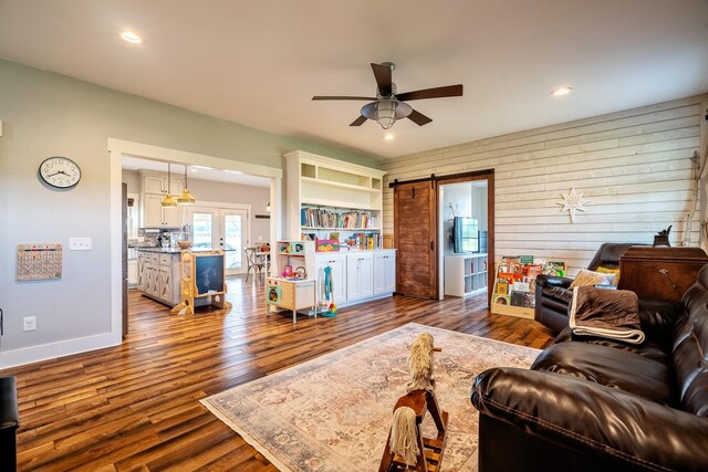 82 Staggs Rd, Ethridge, TN 38456 - living room featuring a barn door, ceiling fan, dark wood-style floors, recessed lighting, and baseboards