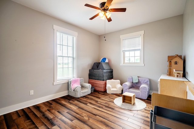 82 Staggs Rd, Ethridge, TN 38456 - living area featuring a ceiling fan, wood finished floors, and baseboards