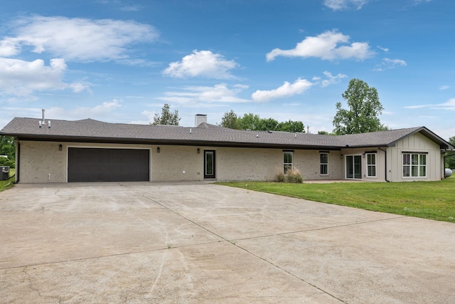 358 Coopertown Rd, Unionville, TN 37180 - single story home featuring an attached garage, a chimney, a front lawn, driveway, and board and batten siding
