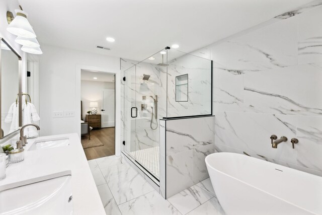 358 Coopertown Rd, Unionville, TN 37180 - full bath with a marble finish shower, a soaking tub, recessed lighting, double vanity, and ensuite bathroom