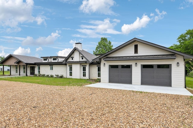 358 Coopertown Rd, Unionville, TN 37180 - modern farmhouse style home featuring a chimney, concrete driveway, an attached garage, and a front lawn