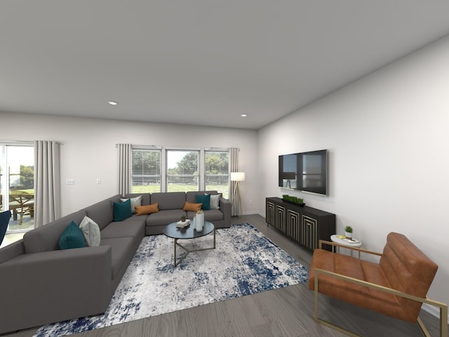 living area featuring wood finished floors, recessed lighting, and baseboards