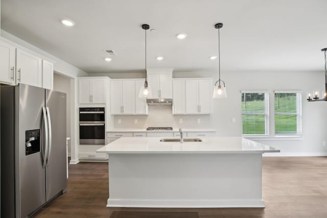 4621 Winslet Dr, Smyrna, TN 37167 - kitchen featuring stainless steel refrigerator with ice dispenser, a sink, double wall oven, under cabinet range hood, and light countertops