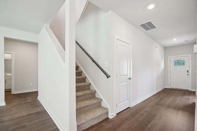 4621 Winslet Dr, Smyrna, TN 37167 - entryway with dark wood-style floors, stairs, recessed lighting, and baseboards