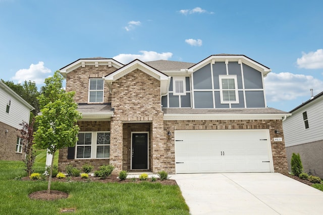 4621 Winslet Dr, Smyrna, TN 37167 - view of front facade with driveway, a garage, and brick siding