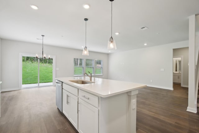 4621 Winslet Dr, Smyrna, TN 37167 - kitchen with a sink, dishwasher, dark wood-style flooring, light countertops, and a kitchen island with sink