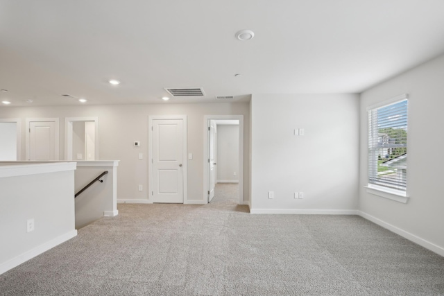 4621 Winslet Dr, Smyrna, TN 37167 - spare room featuring light colored carpet, baseboards, and recessed lighting