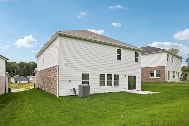 4621 Winslet Dr, Smyrna, TN 37167 - back of house with a lawn, central AC, and brick siding