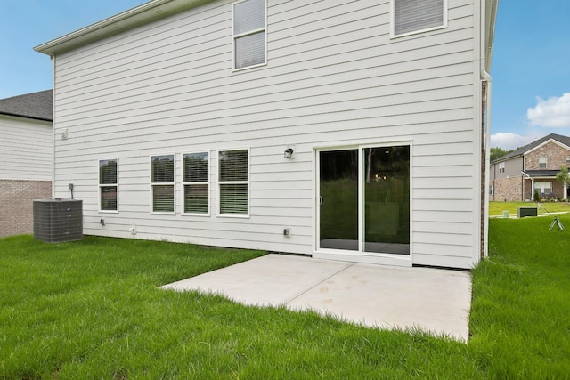 4621 Winslet Dr, Smyrna, TN 37167 - rear view of house with central AC unit, a patio, and a yard