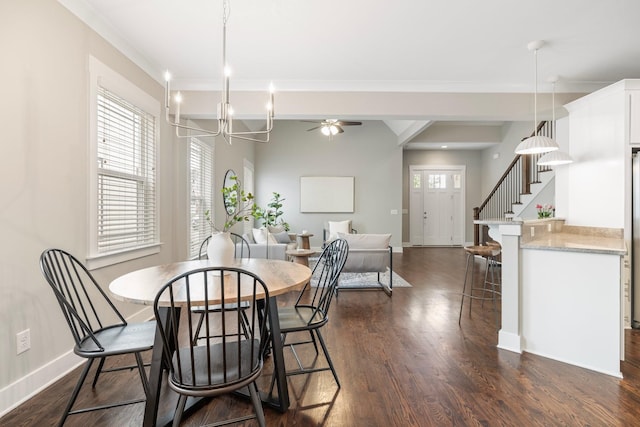 513 Westboro Dr, Nashville, TN 37209 - dining room featuring dark wood-style floors, a chandelier, baseboards, stairs, and crown molding