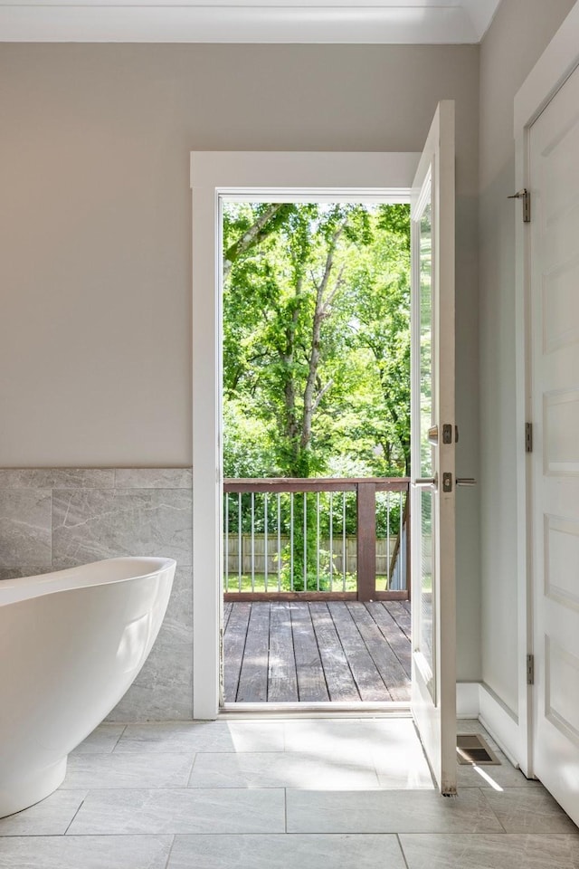 513 Westboro Dr, Nashville, TN 37209 - doorway with tile walls and a wainscoted wall
