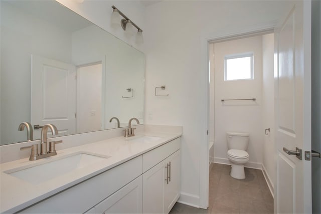 113 W Cassa Way, Mount Juliet, TN 37122 - bathroom with double vanity, toilet, baseboards, and tile patterned flooring