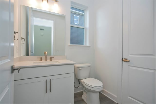 113 W Cassa Way, Mount Juliet, TN 37122 - bathroom with vanity, toilet, baseboards, and wood finished floors
