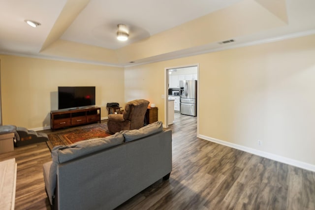 2130 River Chase Dr, Murfreesboro, TN 37128 - living area with a tray ceiling, baseboards, and dark wood-style flooring