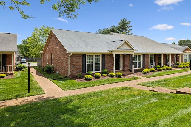 2130 River Chase Dr, Murfreesboro, TN 37128 - view of front of home featuring brick siding, a front lawn, and a shingled roof