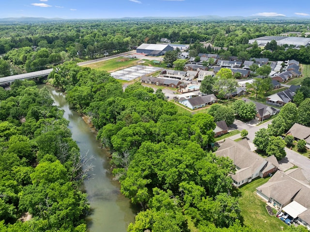 2130 River Chase Dr, Murfreesboro, TN 37128 - aerial perspective of suburban area featuring a nearby body of water, a notable bridge, and a heavily wooded area