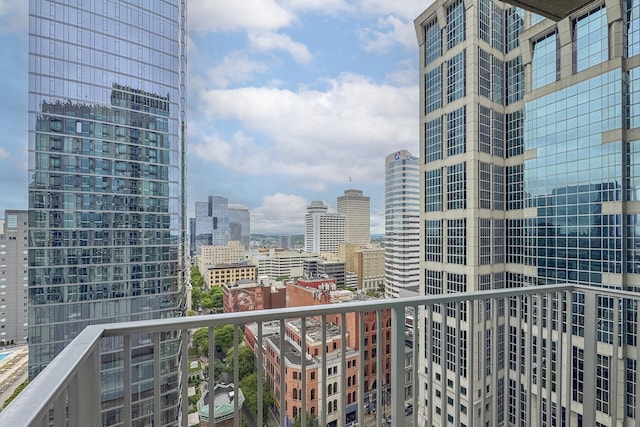 balcony featuring a city view