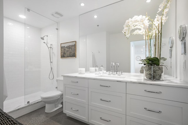 bathroom featuring a tile shower, toilet, vanity, and recessed lighting