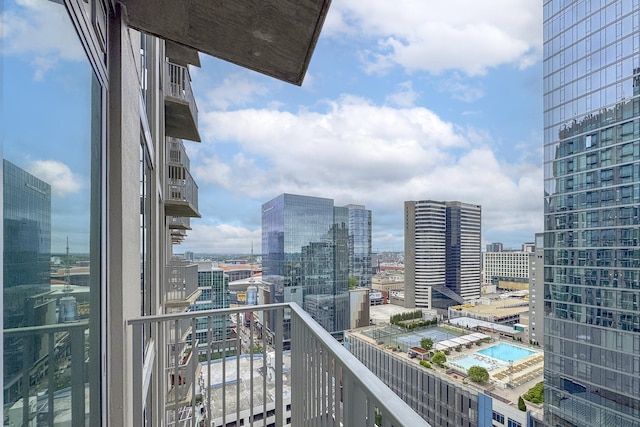balcony featuring a view of city and view of pool