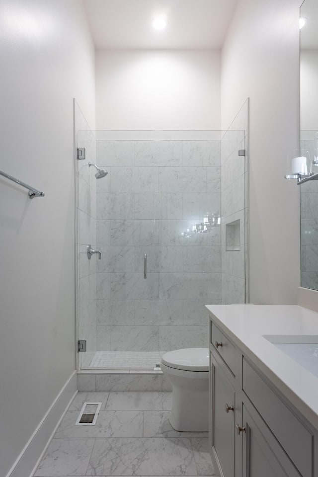 504 Doubleday Ln, Brentwood, TN 37027 - bathroom featuring a stall shower, marble finish flooring, toilet, vanity, and recessed lighting