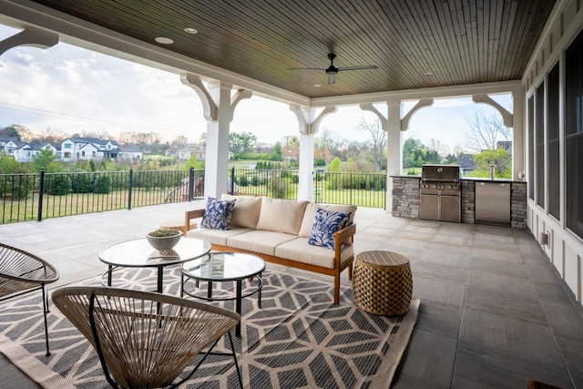 504 Doubleday Ln, Brentwood, TN 37027 - view of patio / terrace with exterior kitchen, fence, a grill, a ceiling fan, and an outdoor hangout area