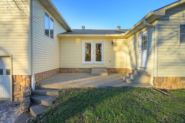 311 Locust St, Alexandria, TN 37012 - view of exterior entry with crawl space, french doors, and roof with shingles
