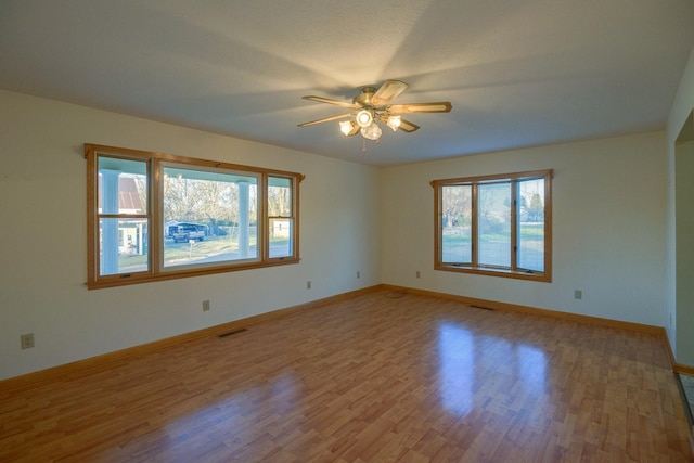 311 Locust St, Alexandria, TN 37012 - unfurnished room with ceiling fan, wood finished floors, and baseboards