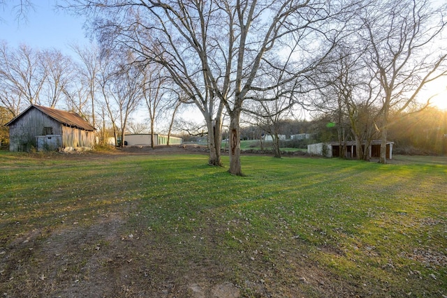 311 Locust St, Alexandria, TN 37012 - view of green lawn with a barn and an outbuilding