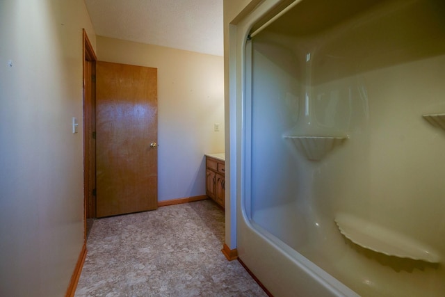 311 Locust St, Alexandria, TN 37012 - bathroom featuring vanity, baseboards, and a shower