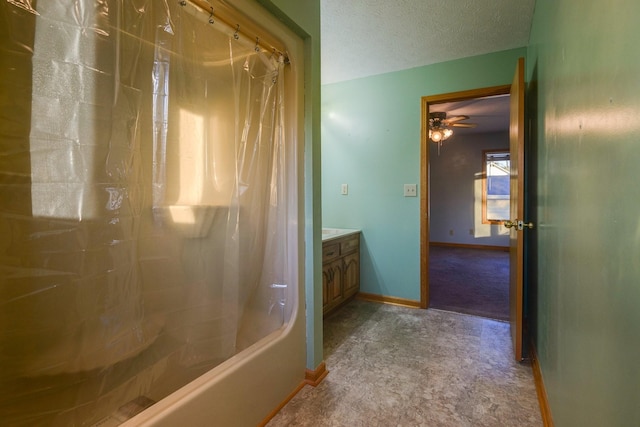 311 Locust St, Alexandria, TN 37012 - bathroom with vanity, baseboards, a textured ceiling, and a ceiling fan