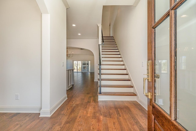 1709 Martha Washington Way, Murfreesboro, TN 37130 - stairway with arched walkways, wood finished floors, baseboards, and recessed lighting