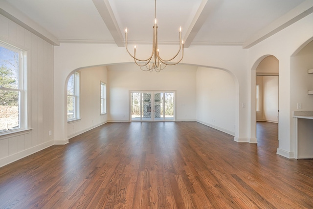 1709 Martha Washington Way, Murfreesboro, TN 37130 - empty room featuring beam ceiling, arched walkways, a chandelier, dark wood-style floors, and baseboards