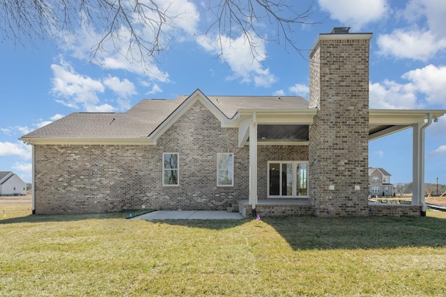 1709 Martha Washington Way, Murfreesboro, TN 37130 - back of property with a chimney, brick siding, and a yard