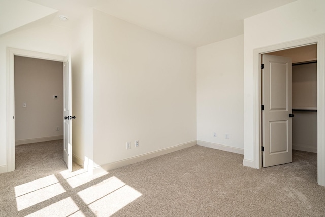 1709 Martha Washington Way, Murfreesboro, TN 37130 - unfurnished bedroom with carpet floors, baseboards, and a walk in closet