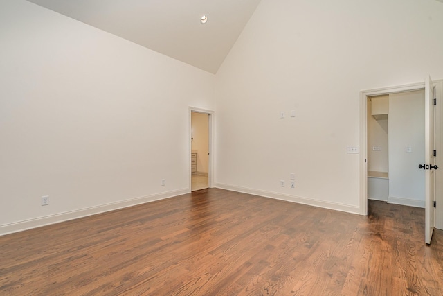 1709 Martha Washington Way, Murfreesboro, TN 37130 - empty room with high vaulted ceiling, dark wood finished floors, and baseboards