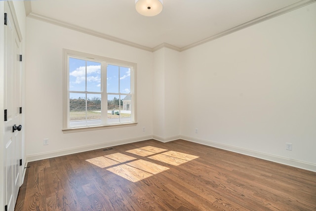 1709 Martha Washington Way, Murfreesboro, TN 37130 - spare room featuring crown molding, dark wood-type flooring, and baseboards