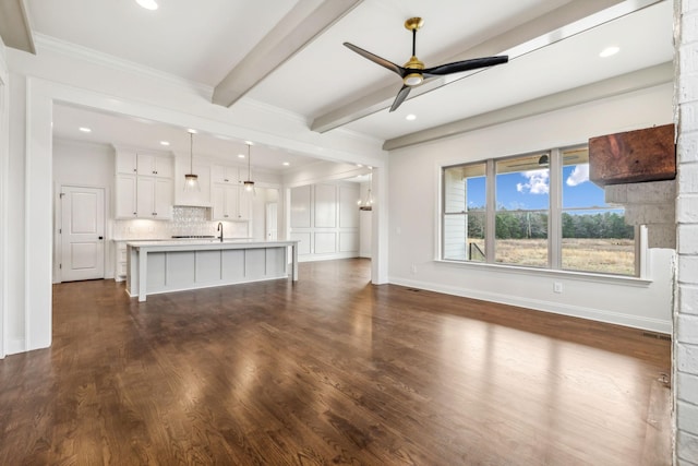 1900 Martha Washington Way, Murfreesboro, TN 37130 - unfurnished living room featuring crown molding, beam ceiling, dark wood-type flooring, a ceiling fan, and recessed lighting