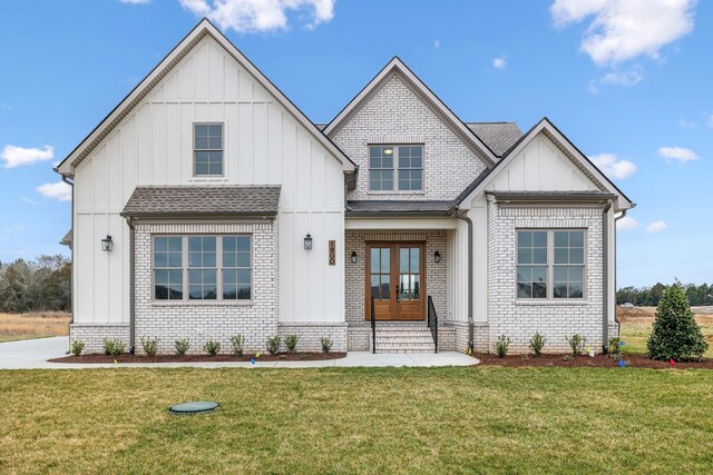 1900 Martha Washington Way, Murfreesboro, TN 37130 - view of front facade with board and batten siding, brick siding, and a front yard