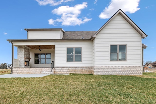 1900 Martha Washington Way, Murfreesboro, TN 37130 - back of property with a lawn, roof with shingles, and a patio area