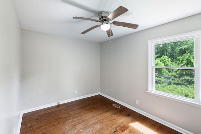 932 Circle Dr, Springfield, TN 37172 - unfurnished room with baseboards, dark wood-type flooring, and ceiling fan