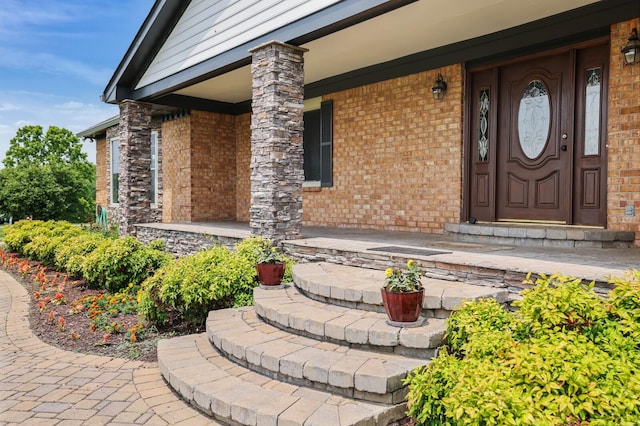 1361 Madison Creek Rd, Goodlettsville, TN 37072 - entrance to property with a porch and brick siding