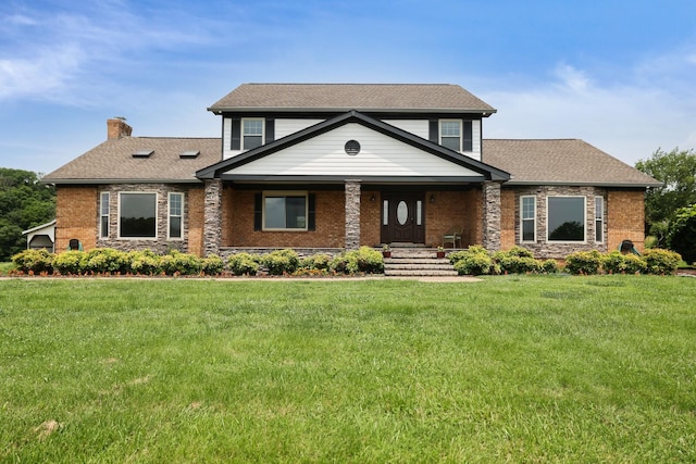 1361 Madison Creek Rd, Goodlettsville, TN 37072 - view of front of house featuring a chimney, a front lawn, a porch, and a shingled roof